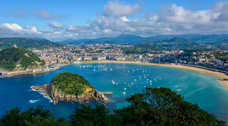 The shell-shaped La Concha bay and San Sebastian seen from Monte Igueldo